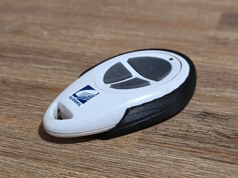 Kẹp giữ remote cửa garage Gliderol dạng dán (Stick-on mount) - Image 1