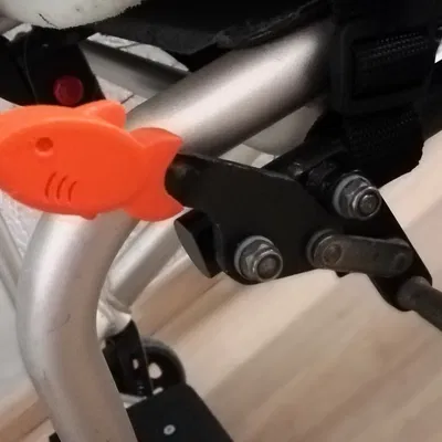 Ống bọc cá vàng cho phanh xe lăn (Goldfish-sleeve for wheelchair-brakes)