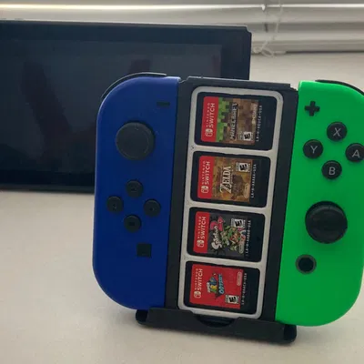 Tay cầm Nintendo Switch Joycon Grip kèm khay đựng game