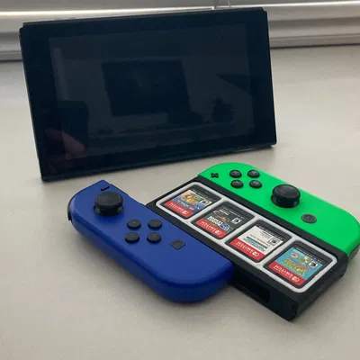 Tay cầm Nintendo Switch Joycon Grip kèm khay đựng game