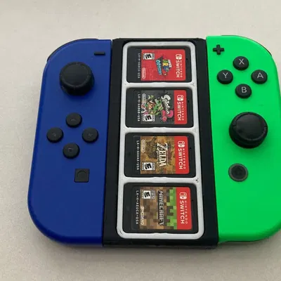 Tay cầm Nintendo Switch Joycon Grip kèm khay đựng game