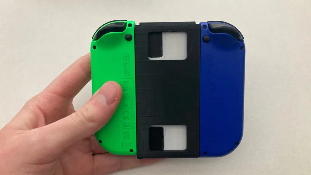 Tay cầm Nintendo Switch Joycon Grip kèm khay đựng game - Image 6