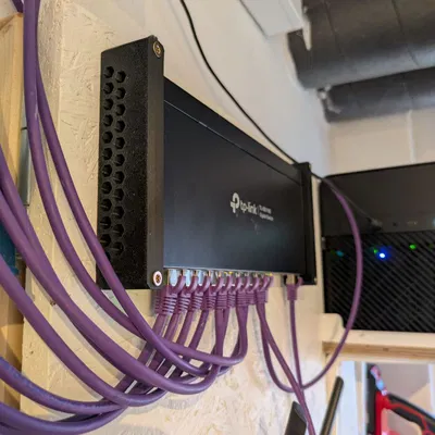 Ngàm treo tường cho TP-Link TL-SG116E