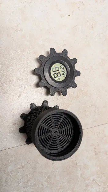 Giá đỡ desiccant gắn giữa lỗ trung tâm của cuộn spool - Image 2