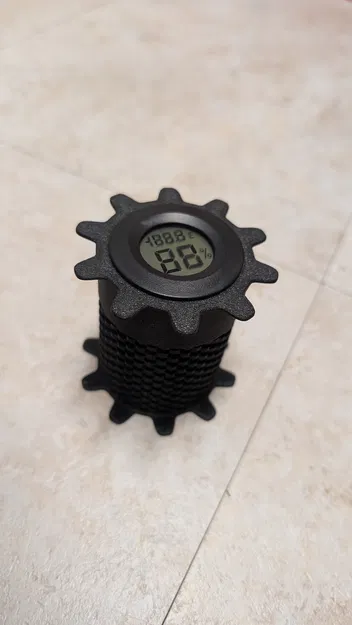 Giá đỡ desiccant gắn giữa lỗ trung tâm của cuộn spool - Image 3