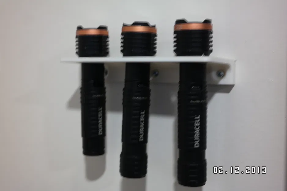 Giá Treo Đèn Pin Duracell 3 Cái Dán Tường Tiện Lợi - Image 1