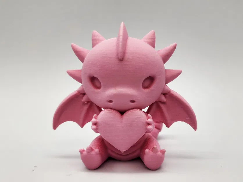 Rồng Dễ Thương Ngồi Ôm Trái Tim - Image 1