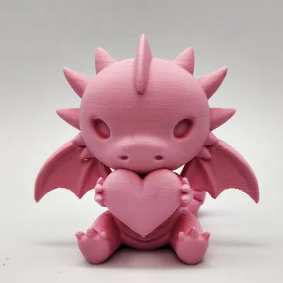 Rồng Dễ Thương Ngồi Ôm Trái Tim