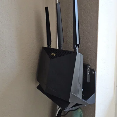 Giá treo tường router Asus RT-AX86U (kèm quản lý dây & ngăn SSD)