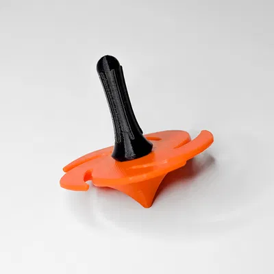 Con quay Spinning Top