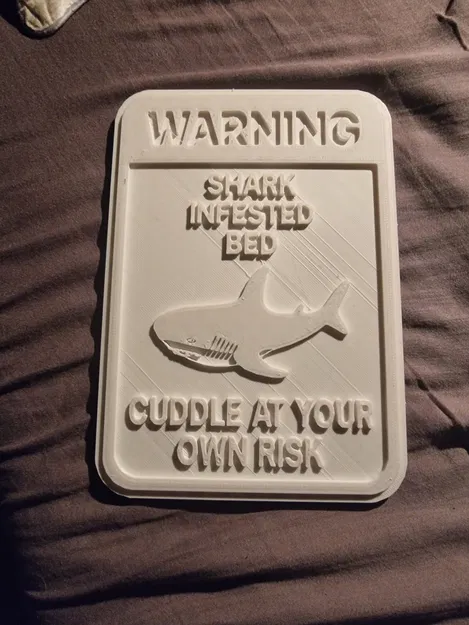 Bảng hài “Cuddle at Your Own Risk” với cá mập IKEA Blåhaj - Image 1