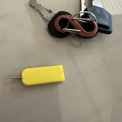 Dụng Cụ Gỡ SIM An Toàn Gắn Móc Khóa Tiện Lợi