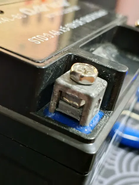 Phụ kiện nâng đỡ ốc bình ắc quy xe máy in 3D - Image 1