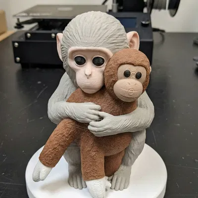 Mô Hình Khỉ Ôm Con "Punch The Monkey" - Quà Tặng Ý Nghĩa