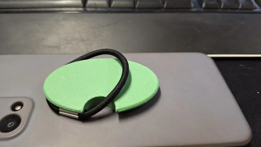 Giá giữ thun buộc tóc gắn sau điện thoại (Hair tie holder for phone) - Image 1