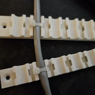 Kẹp giữ dây cáp dưới gầm bàn (Under desk cable holders)