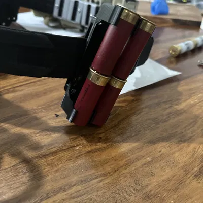 Giá/khay giữ vỏ đạn quad loading (Quad loading shell caddy/holder)