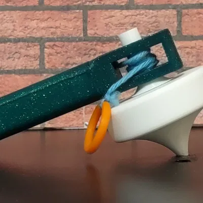 Con quay phát âm lớn khi quay (Loud Tone Generating Spinning Top)