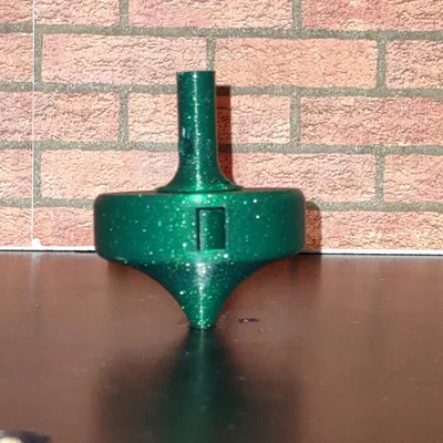 Con quay phát âm lớn khi quay (Loud Tone Generating Spinning Top)