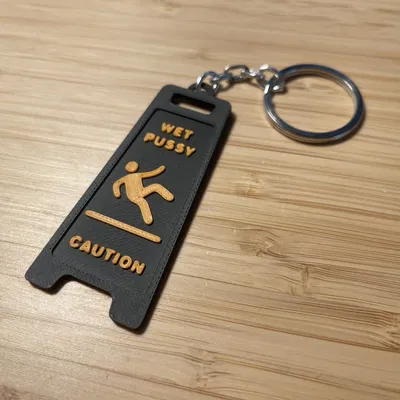 “Caution! Wet Pussy” - Móc khóa