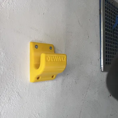 Móc treo máy cắt cỏ DeWalt DCMST561 (zavěšení strunovky)