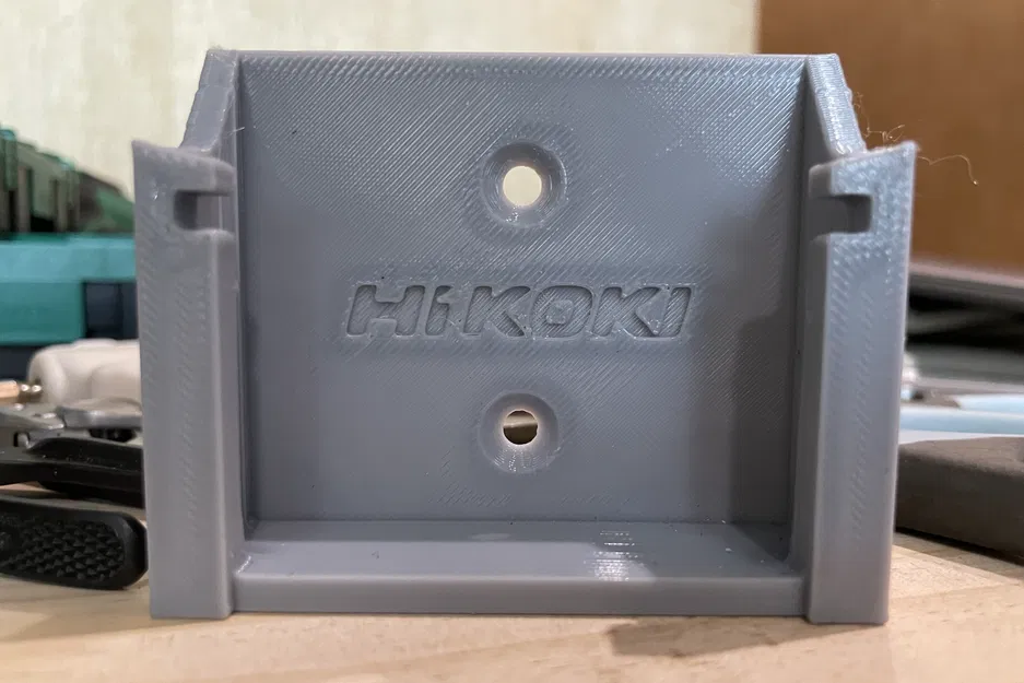 Giá đỡ pin Hikoki gắn tường, giữ pin gọn gàng - Image 1