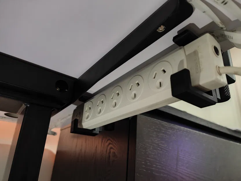 Ngàm kẹp gắn ổ cắm điện dưới bàn (Adjustable power strip clamp mount) - Image 1