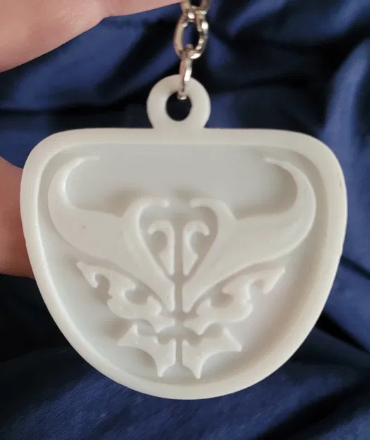 Pacific Rim: The Black - Móc khóa biểu tượng Sisters of the Kaiju - Image 1