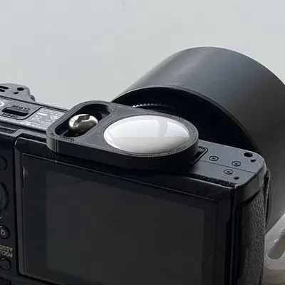 Ngàm gắn AirTag cho máy ảnh