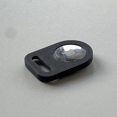 Ngàm gắn AirTag cho máy ảnh