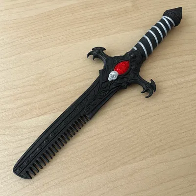 Darkfang – Lược hình kiếm Gothic (dành cho mái tóc nổi loạn và những tâm hồn đen tối)