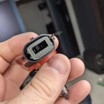 Khung đỡ đầu nối dây điện đèn pha H11 cho GMC Terrain