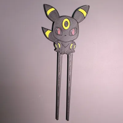Kẹp tóc hoặc đồ trang trí hình Umbreon
