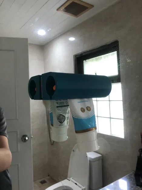 Giá đỡ dụng cụ ép kem đánh răng gắn gương tiện lợi cho phòng tắm - Image 1