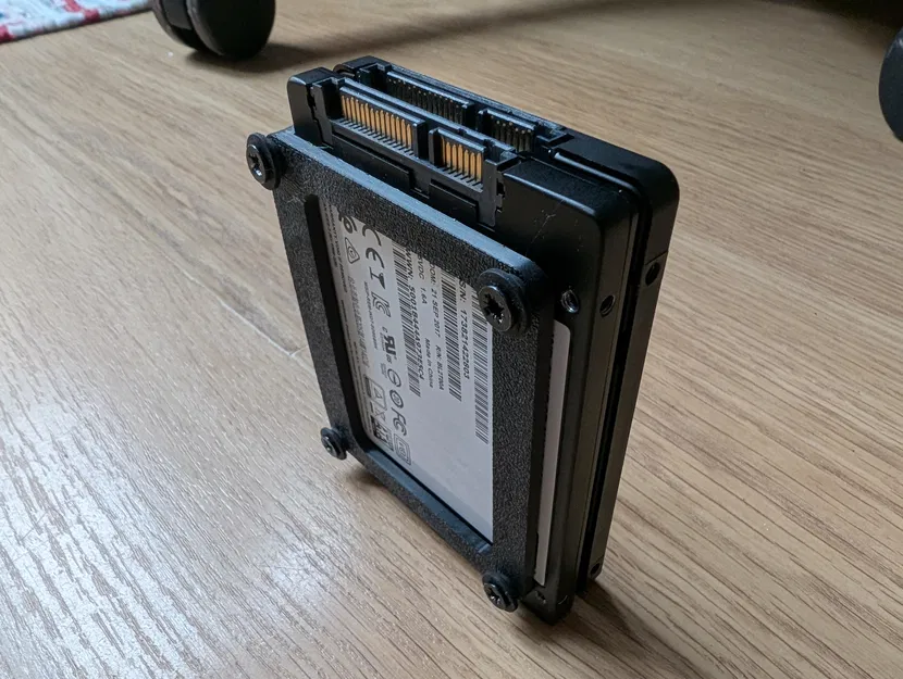 Ngàm gắn SSD cho Lian Li A3 – Lắp thêm SSD dưới bộ nguồn - Image 1