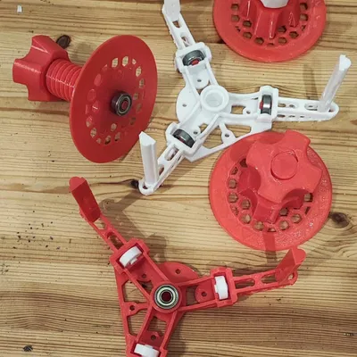 Giá đỡ cuộn in nằm ngang với cơ chế tháo nhanh và 4 vòng bi 608