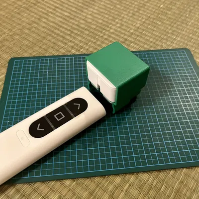 Adapter gắn SwitchBot BOT cho remote cửa cuốn YKK AP