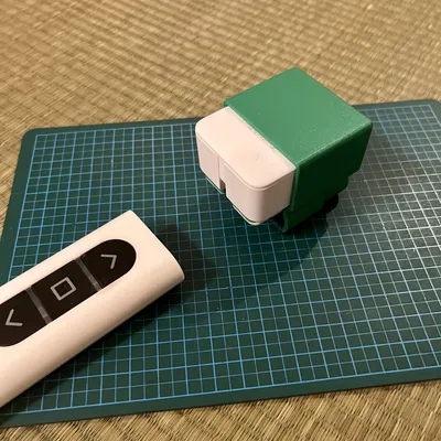 Adapter gắn SwitchBot BOT cho remote cửa cuốn YKK AP