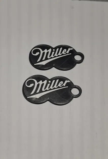 Đồng xu nhựa mở khóa xe đẩy siêu thị hình logo Miller (Shopping Cart Token) - Image 1