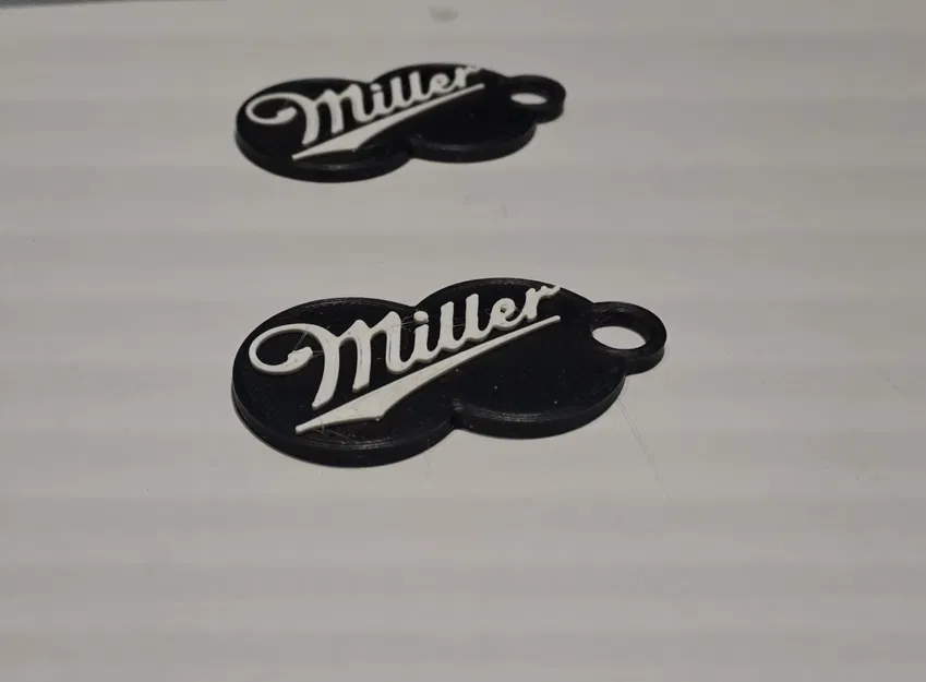 Đồng xu nhựa mở khóa xe đẩy siêu thị hình logo Miller (Shopping Cart Token) - Image 2