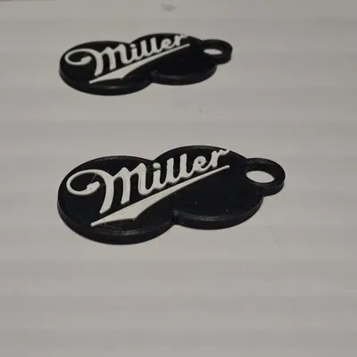 Đồng xu nhựa mở khóa xe đẩy siêu thị hình logo Miller (Shopping Cart Token)