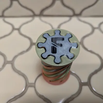 Mô hình Fidget hình xoắn ốc Vortex chữ F