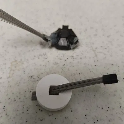 Khung giữ chổi xoay cho robot hút bụi Dibea D960