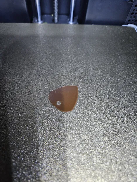 Phím gảy guitar dày 0.071mm có lỗ xỏ chìa khóa - Image 1