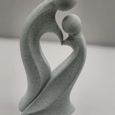 Tượng Cha Mẹ và Con Hình Trái Tim – Tượng Gia Đình