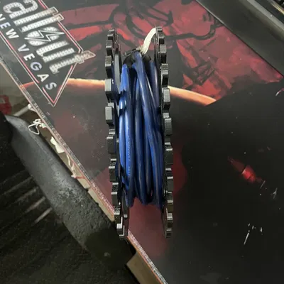 Dụng cụ quấn và sắp xếp dây điện (Extension Cord Coil Organiser)