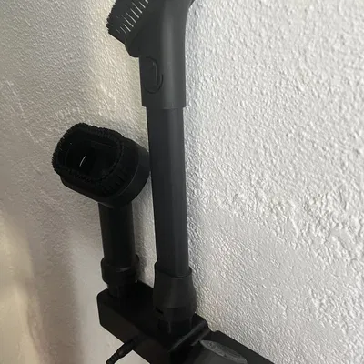 Giá treo tường cải tiến cho máy hút bụi cầm tay Levoit