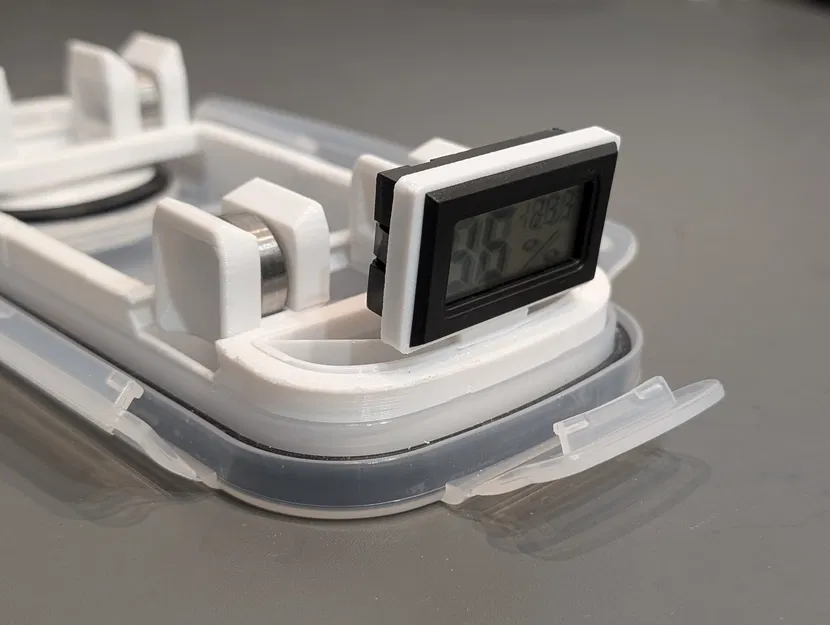 Đế gắn ẩm kế dạng module cho hộp chống ẩm Ultimate Cereal - Image 1