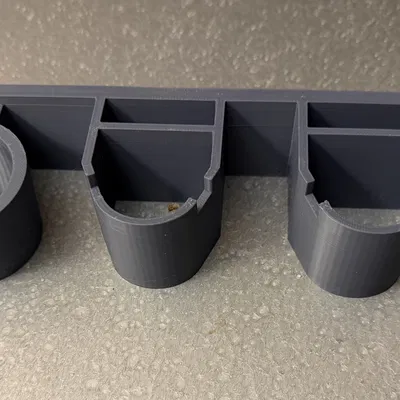 Giá treo tường 3D cho máy khoan Bosch PS20 và bộ 2 pin