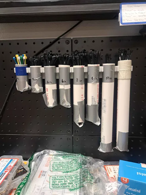 Giá treo ống PVC đựng dây rút (zip tie) trên bảng pegboard - Image 1
